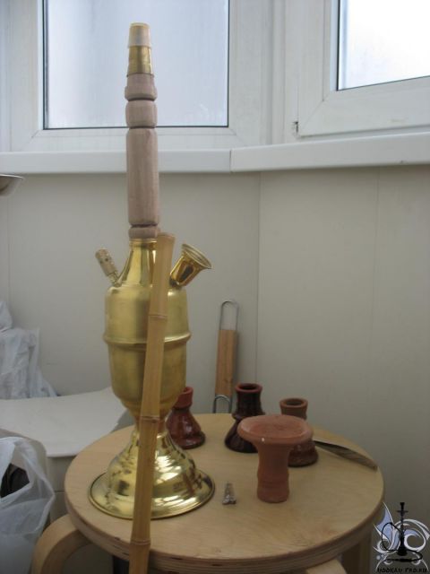 Brass and wooden goza Brass and wooden goza